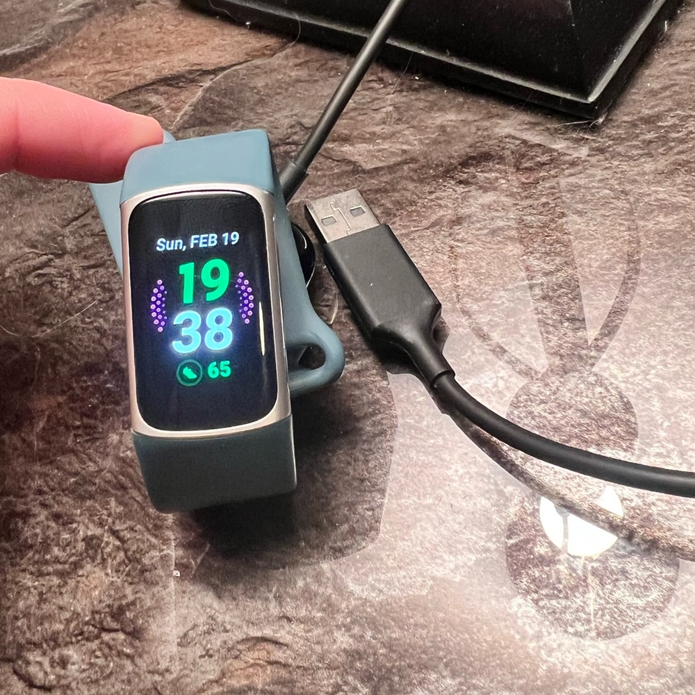 Fitbit charge 5 with charger blue